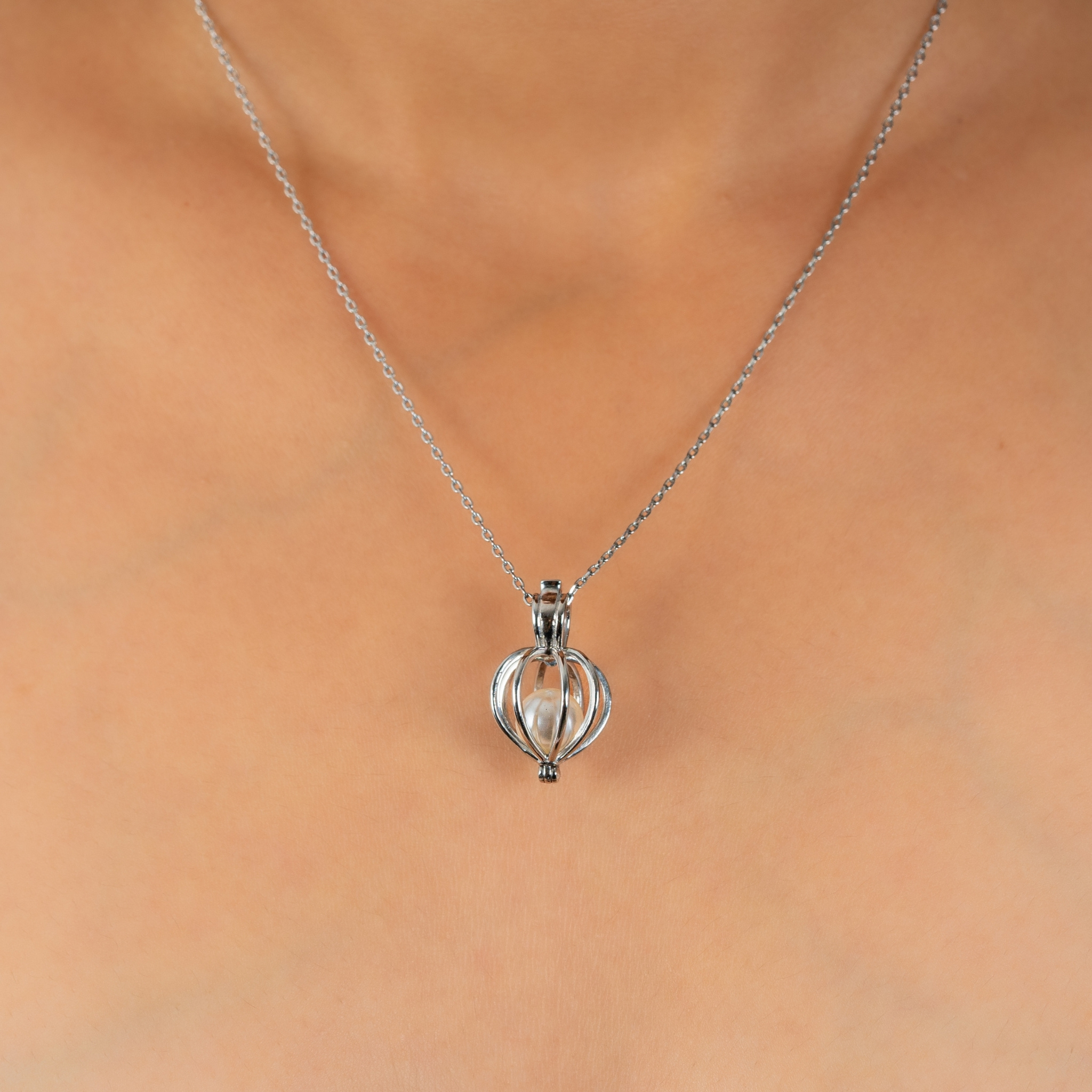 Enclosed Pearl Charm Pendant