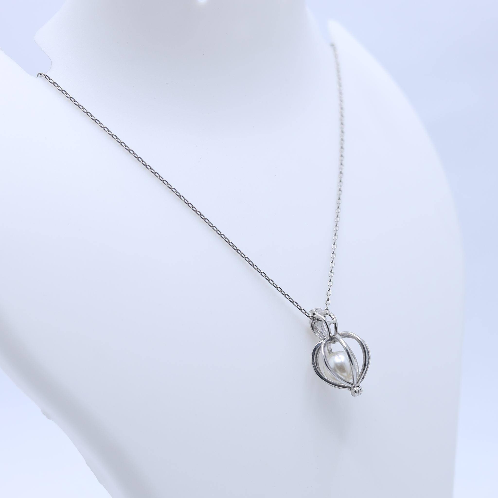 Enclosed Pearl Charm Pendant