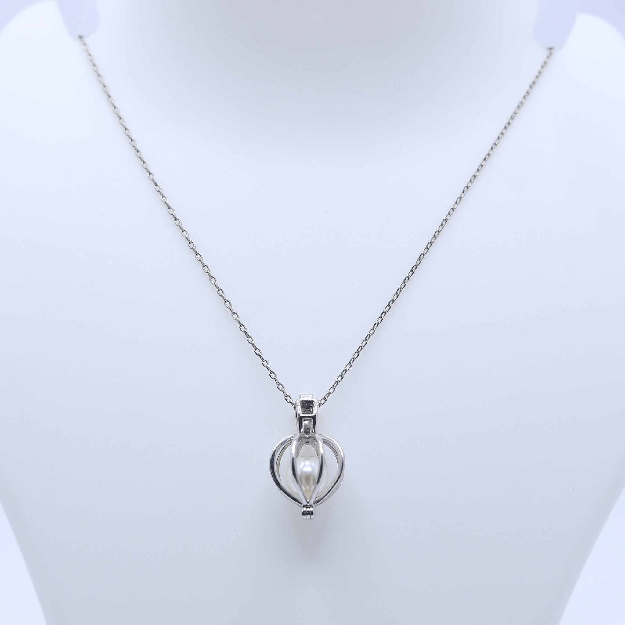 Enclosed Pearl Charm Pendant