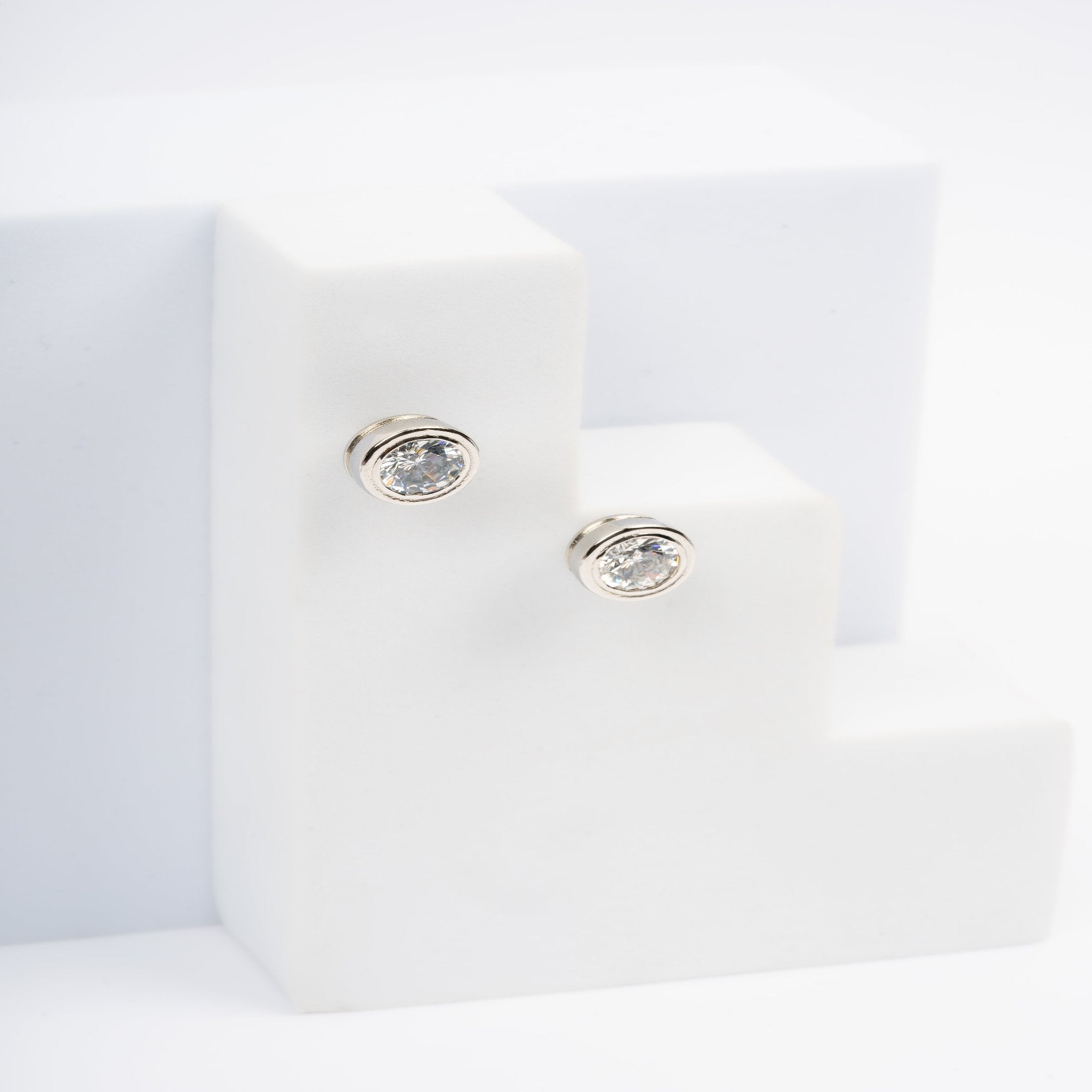 Timeless Round Solitaire White Gold Silver Bezel-Set Earring For Woman
