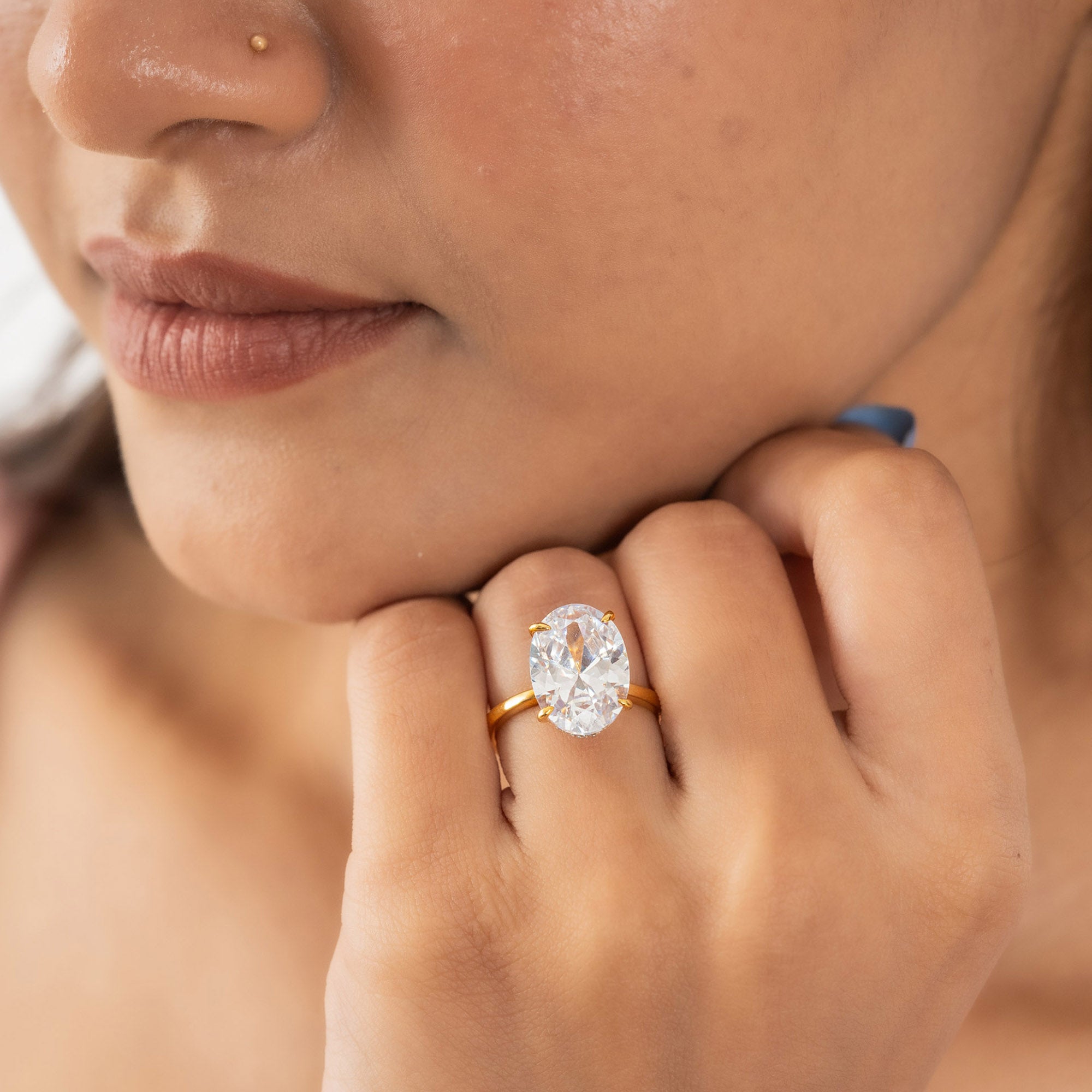 Oval Solitaire Halo Ring