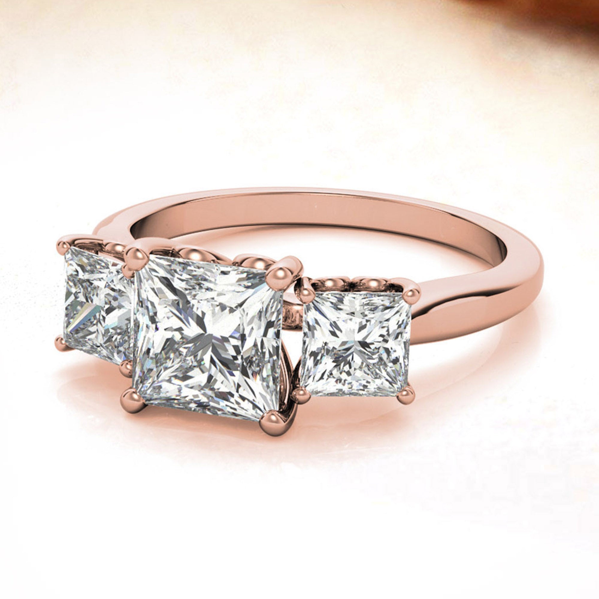 Elegant Three Stone Princess Cut Ring