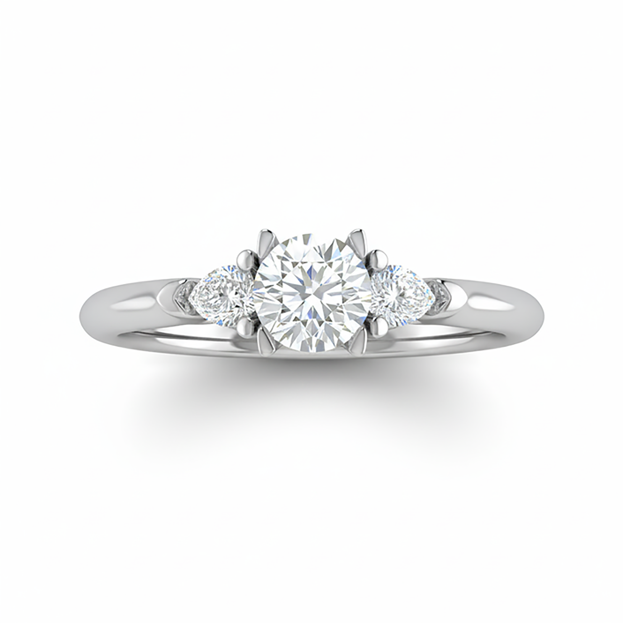 Round and Pear Three Stone Ring