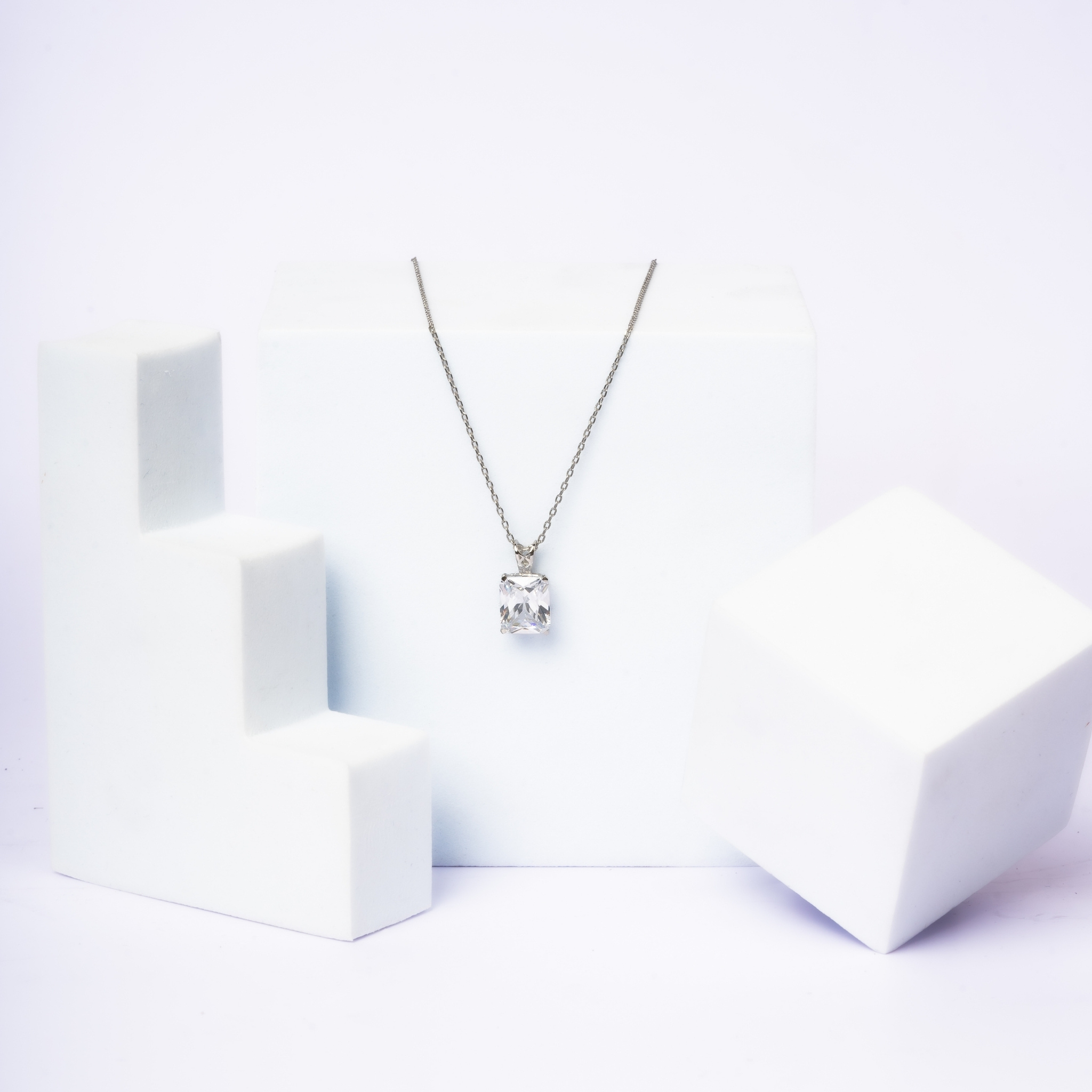 Minimalist Emerald Cut White Gold Solitaire Pendant