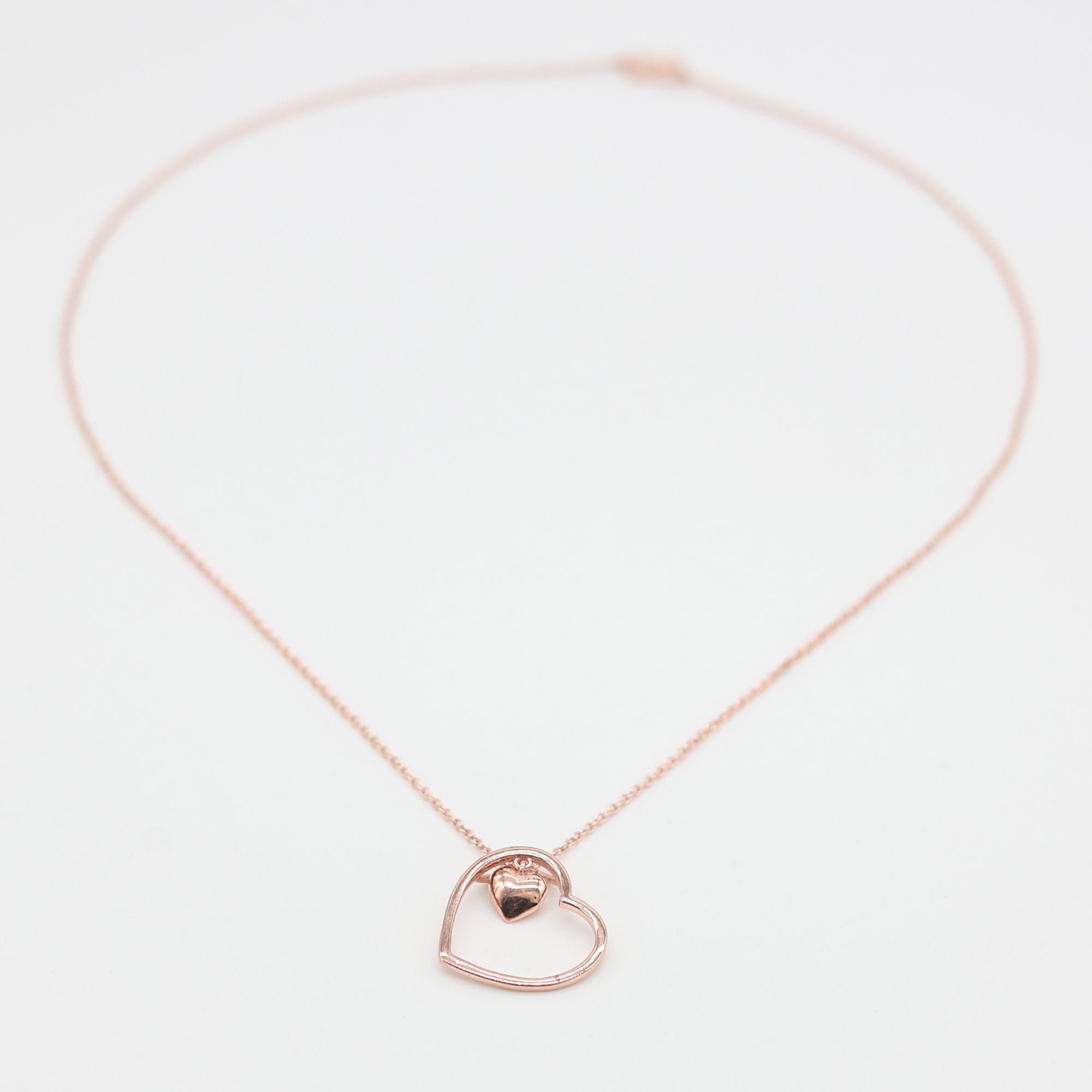 Dual Heart Embrace Pendant