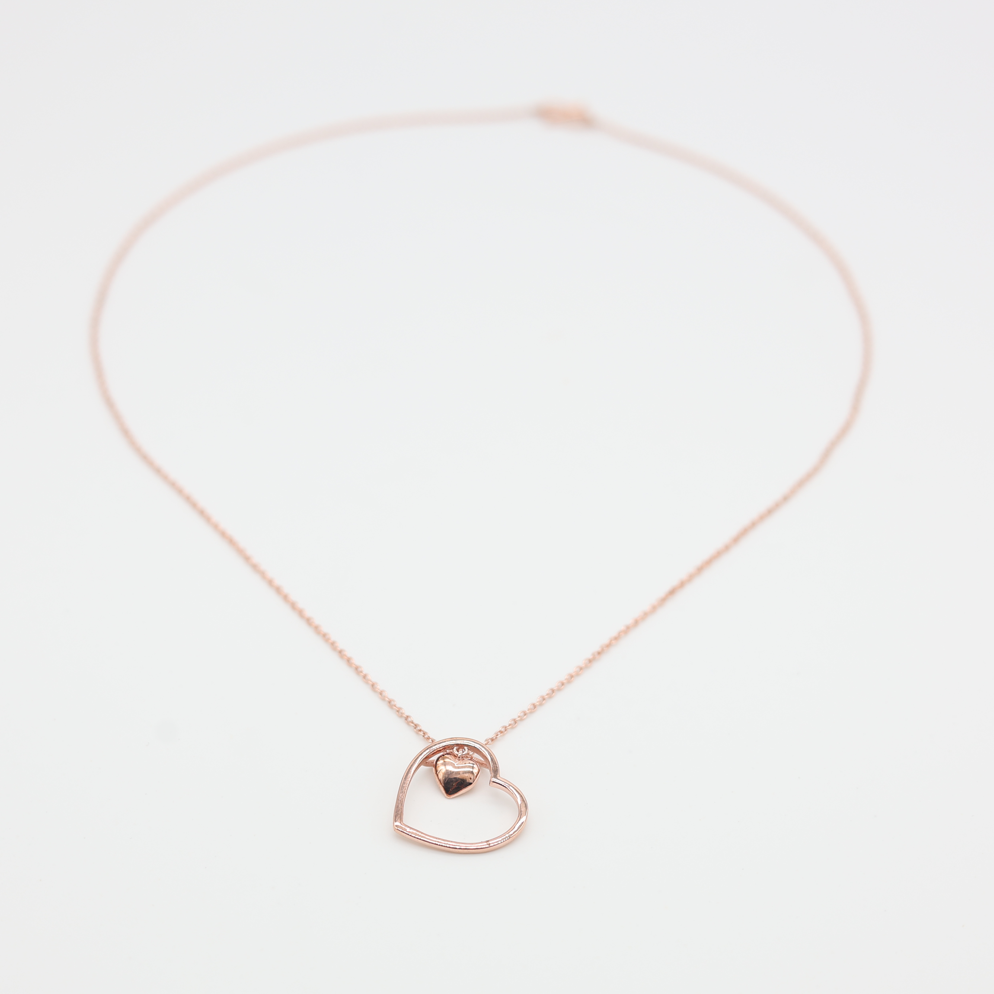 Dual Heart Embrace Pendant