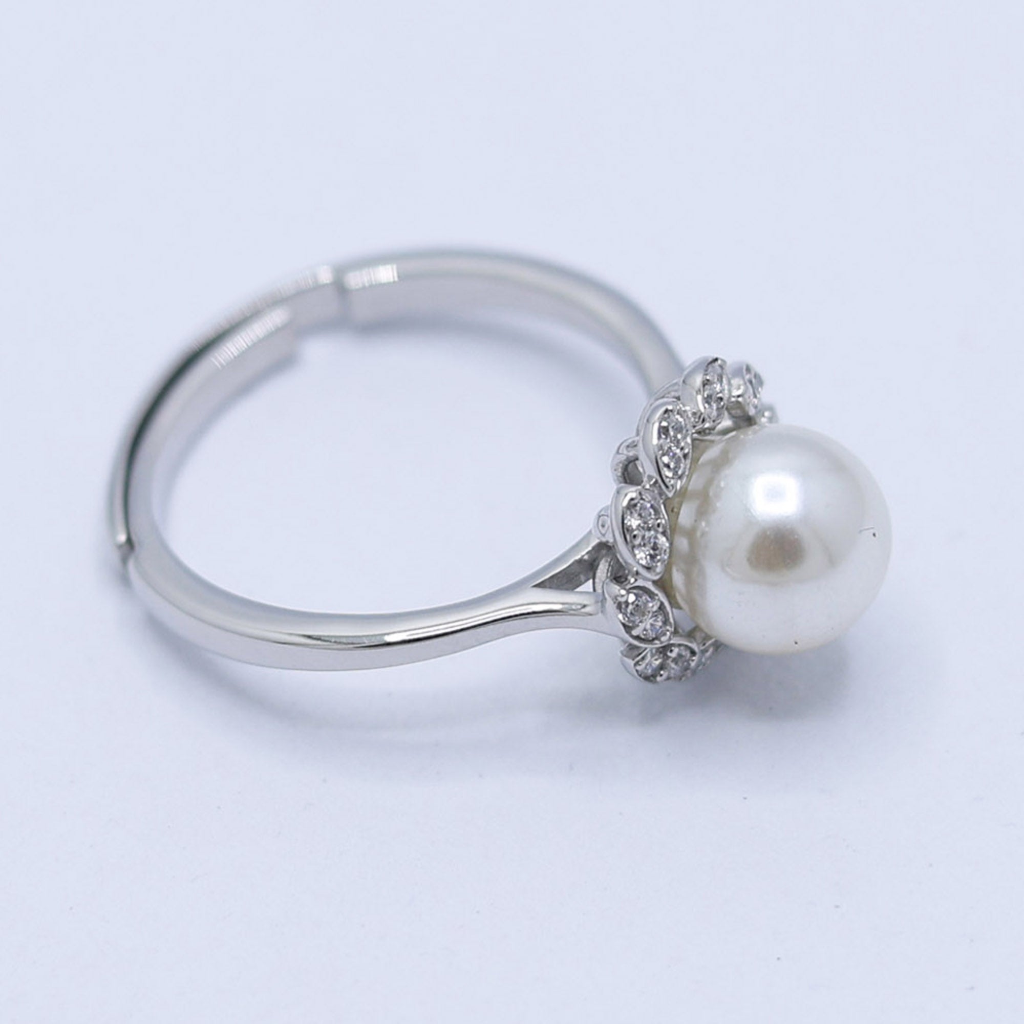 Elegant Pearl Petal Halo Ring
