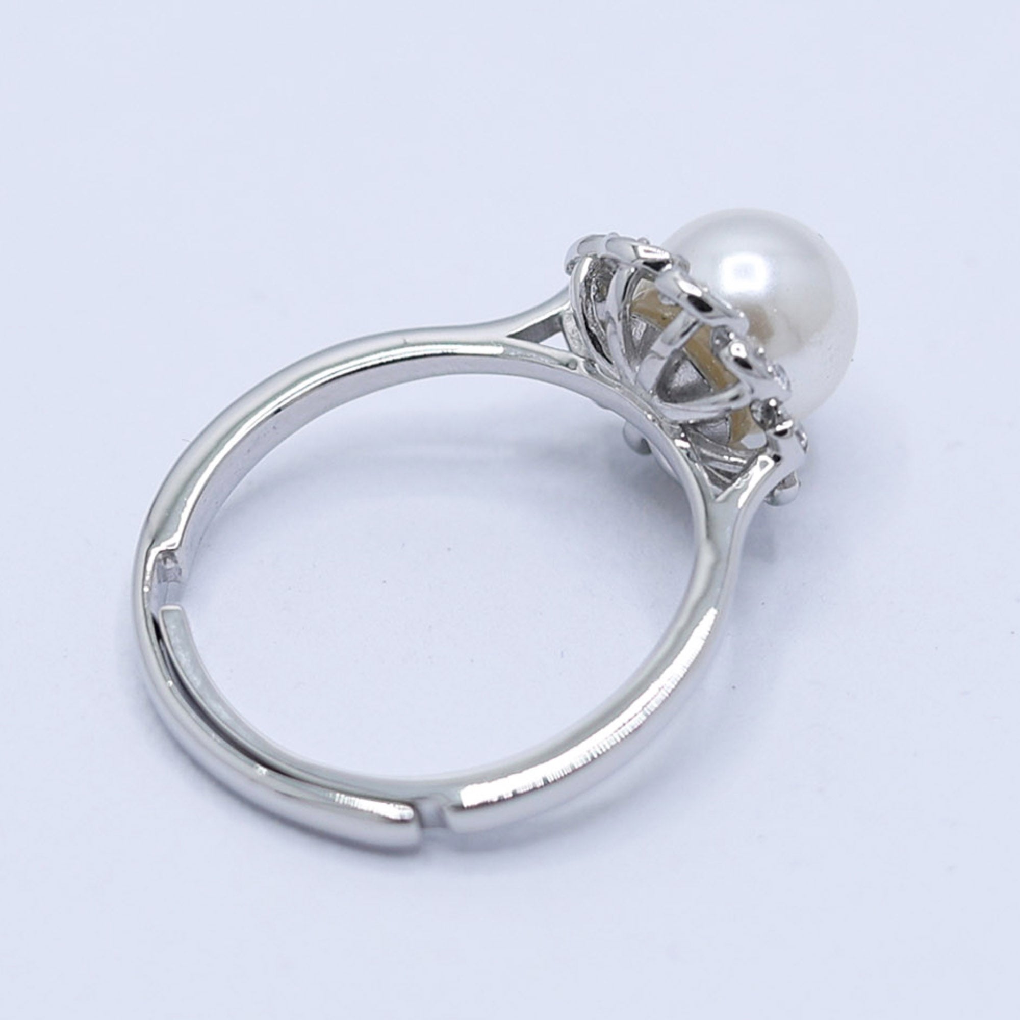 Elegant Pearl Petal Halo Ring