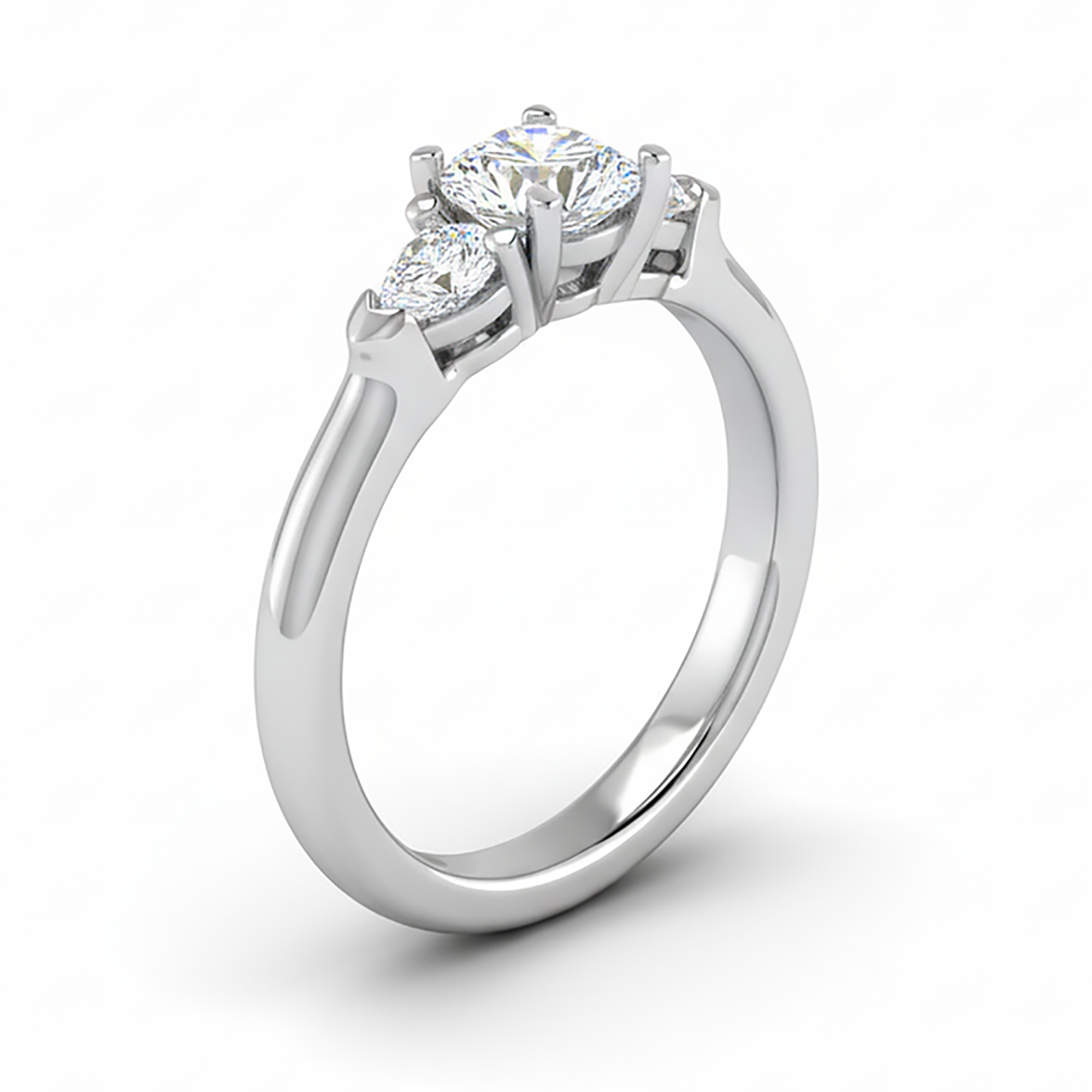 Round and Pear Three Stone Ring